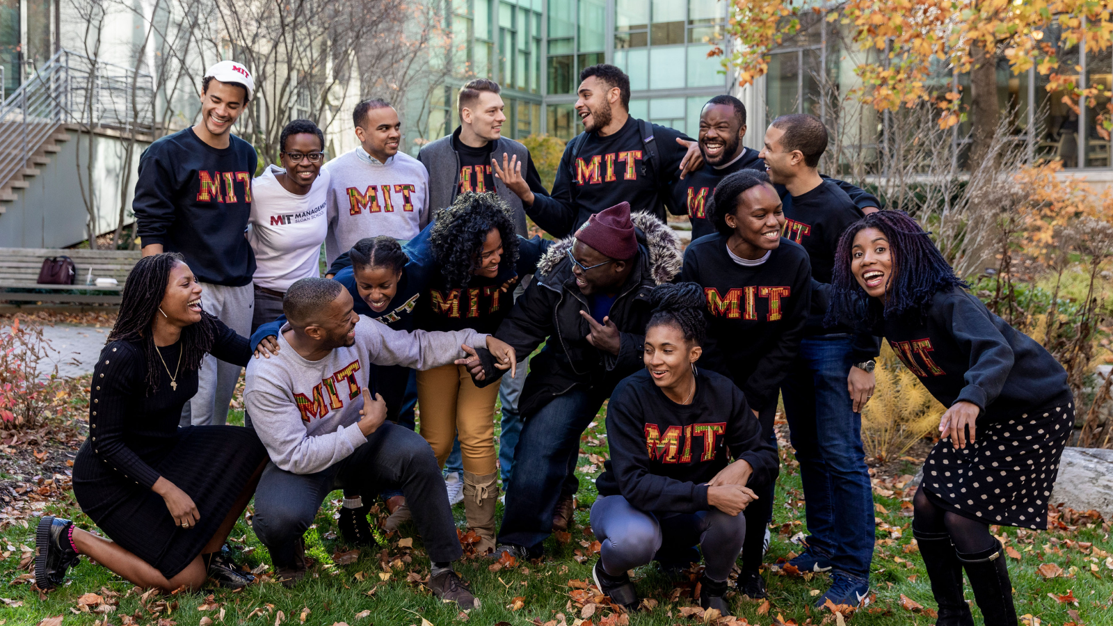 MBA Students from Black Business Students Association (BBSA) and Africa Business Club (ABC) wearing their Kente MIT sweatshirts